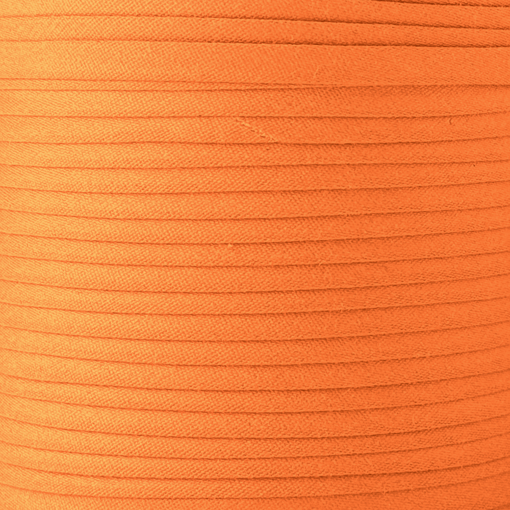 color swatch of the pumpkin pie orange 1/2" double fold bias tape on a spool from Heit's Wholesale bulk sewing supply company