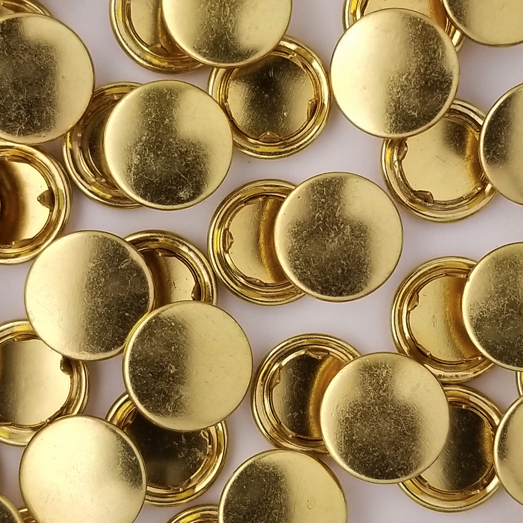 group of the shiny gold size 14 capped snaps with a matte finish from Heit's Wholesale bulk sewing supply company