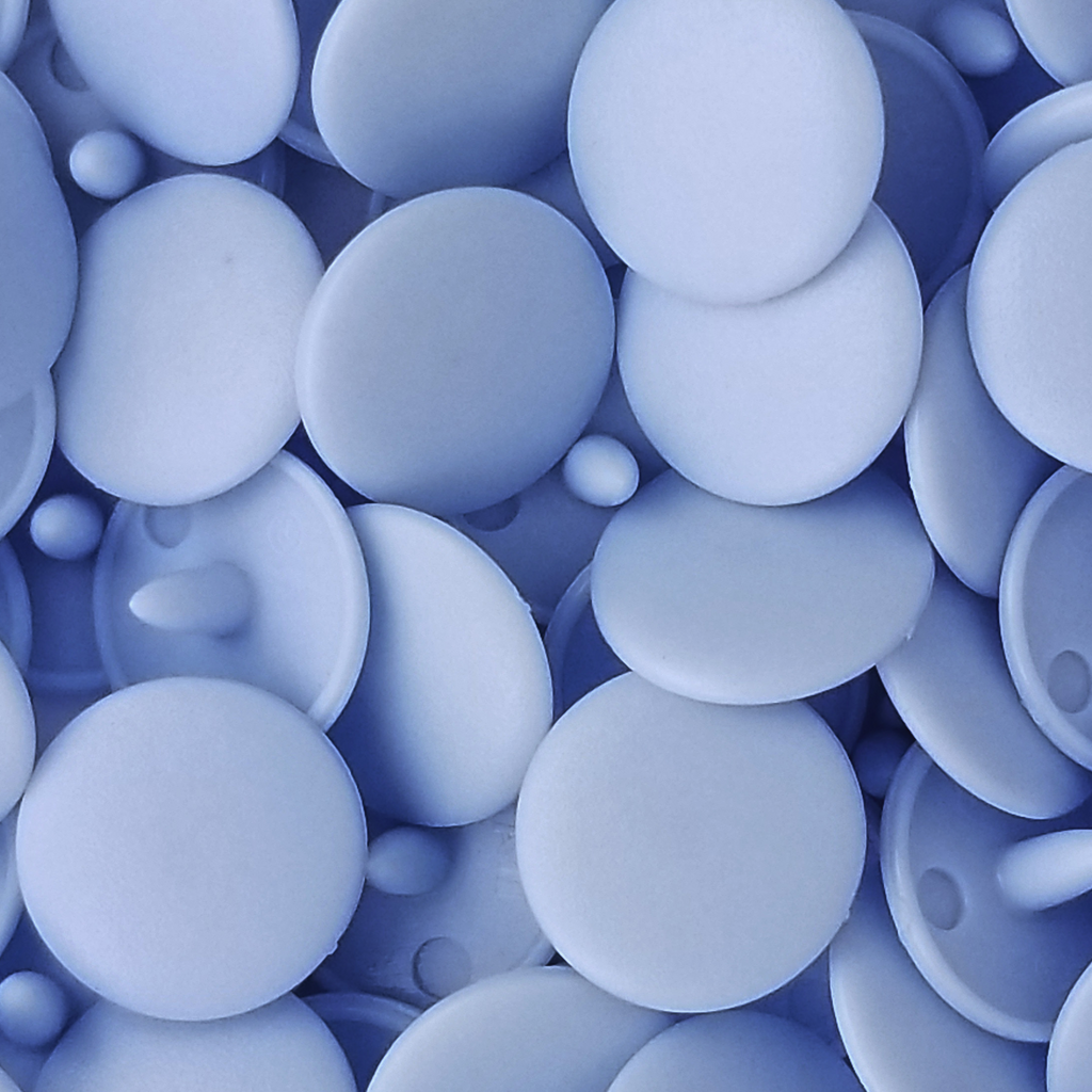 group of the baby blue size 20 poly resin snaps with a matte finish from Heit's Wholesale bulk sewing supply company 