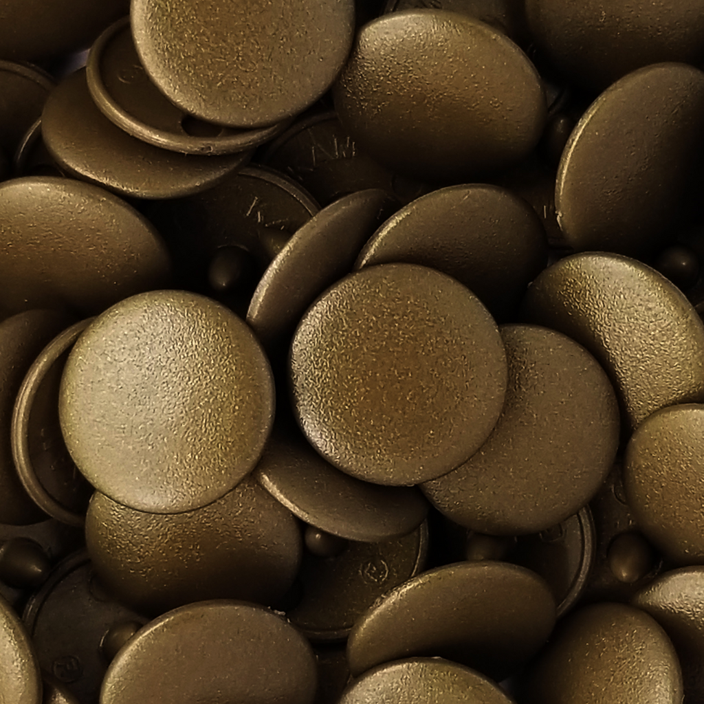 group of the bronze size 20 poly resin snaps with a matte finish from Heit's Wholesale bulk sewing supply company 