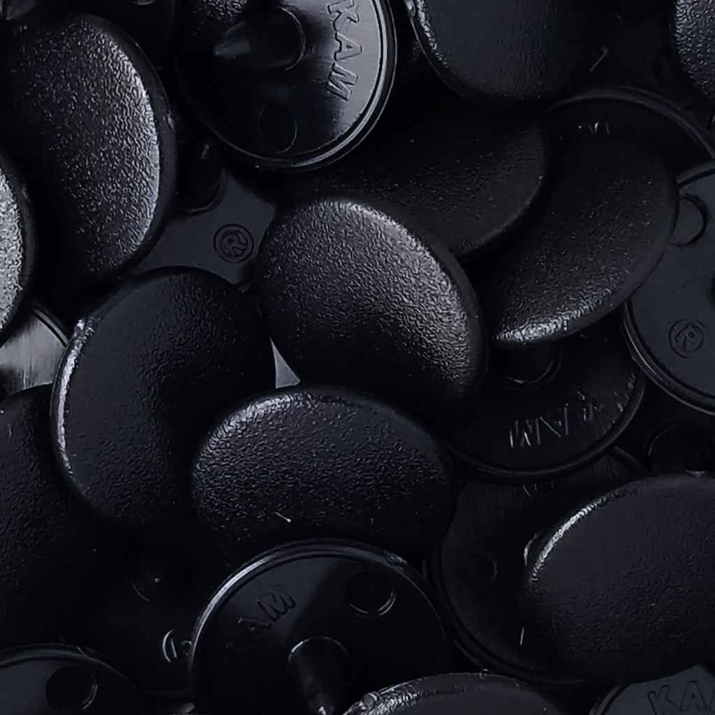 group of the size 24 poly resin snaps with a matte finish from Heit's Wholesale bulk sewing supply company 
