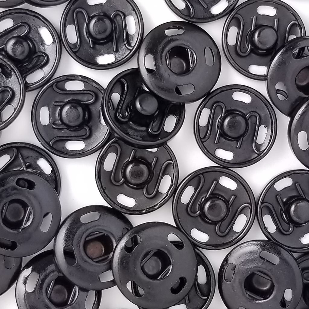 group of the black size 3 sew on snaps from Heit's Wholesale bulk sewing supply company