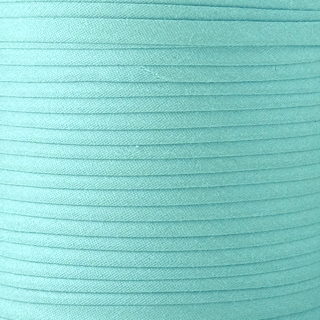 color swatch of the sky blue 1/2" double fold bias tape on a spool from Heit's Wholesale bulk sewing supply company