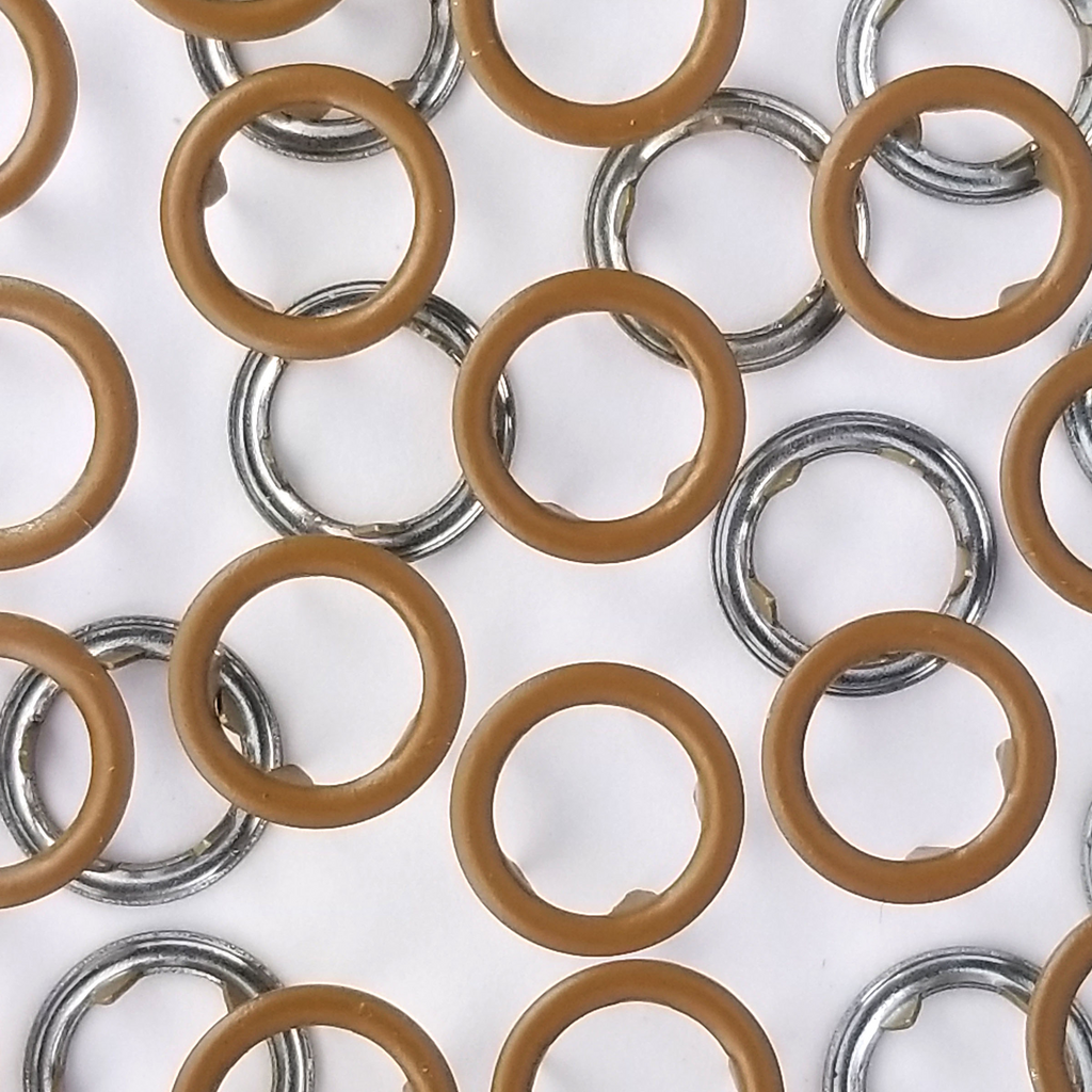 close up of the tan brown size 16 open ring snaps from Heit's Wholesale bulk sewing supply company