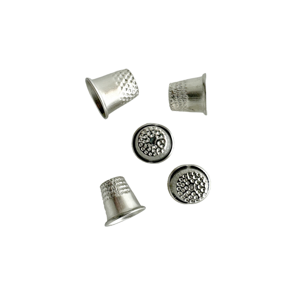 assorted sized thimbles from Heit's Wholesale bulk sewing supply company