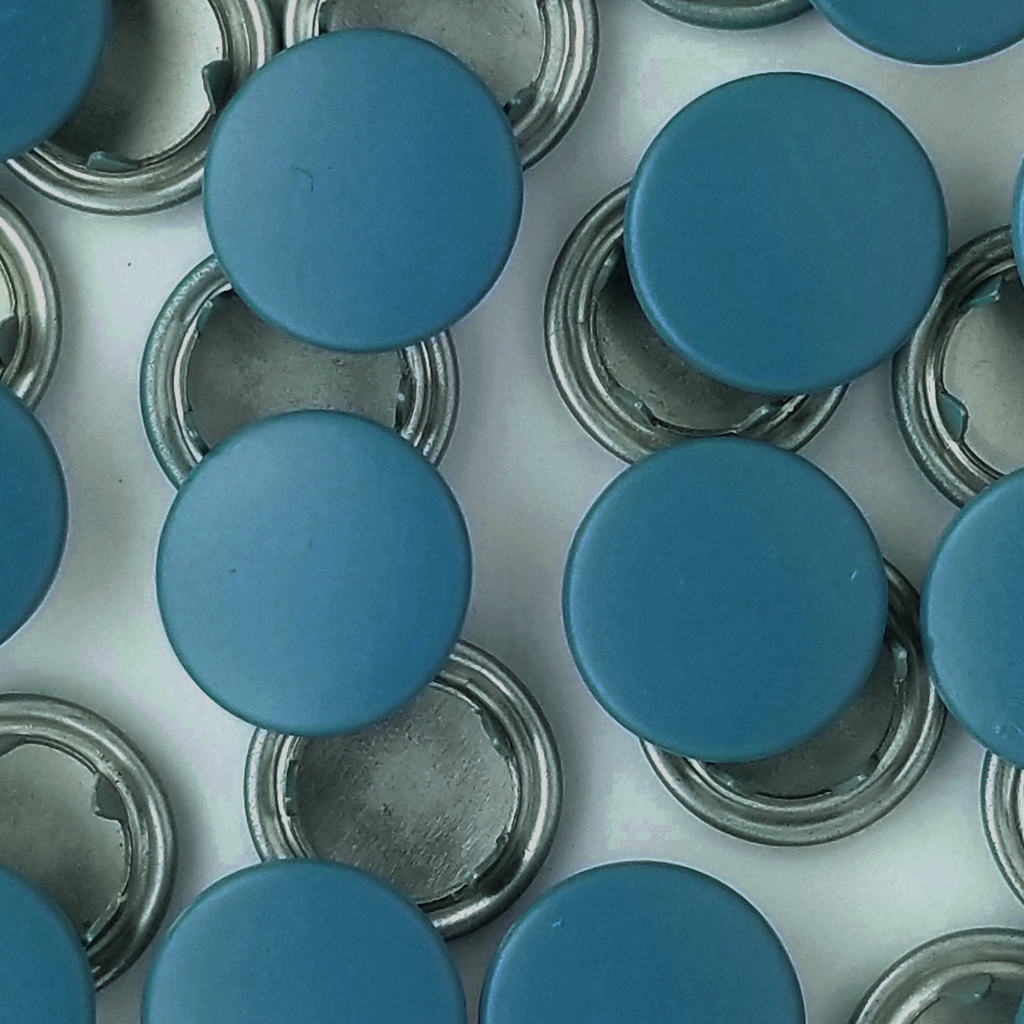 group of the turquoise size 18 capped snaps from Heit's Wholesale bulk sewing supply company 