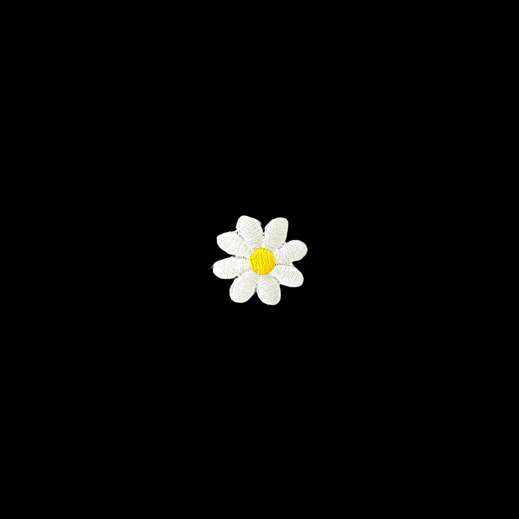 white daisy applique from Heit's Wholesale bulk sewing supply company