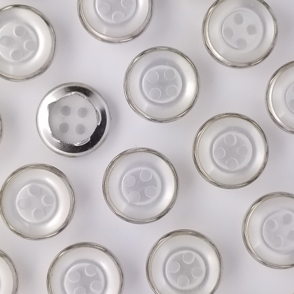 group of the white size 20 button style gripper snaps from Heit's Wholesale bulk sewing supply company