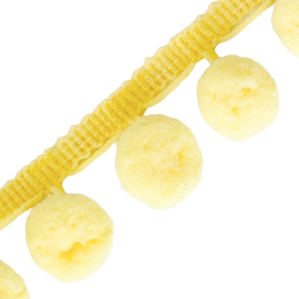 light yellow 1 inch pom pom fringe from Heit's Wholesale bulk sewing supply company